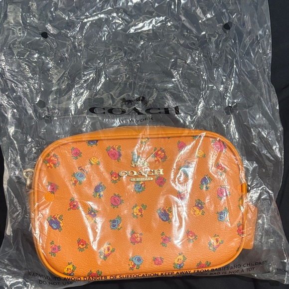 Coach Handbags - Coach Orange Floral Crossbody Bag
